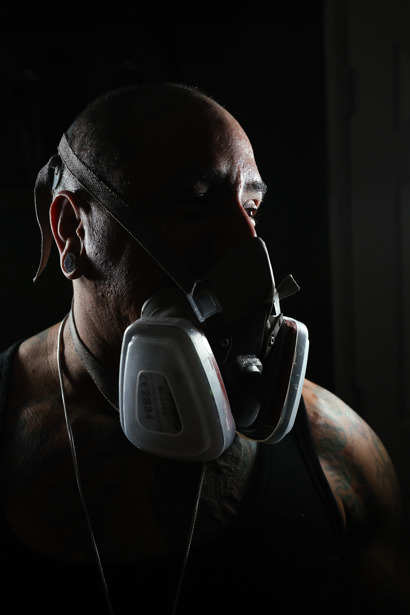 André Fila working in a respirator mask